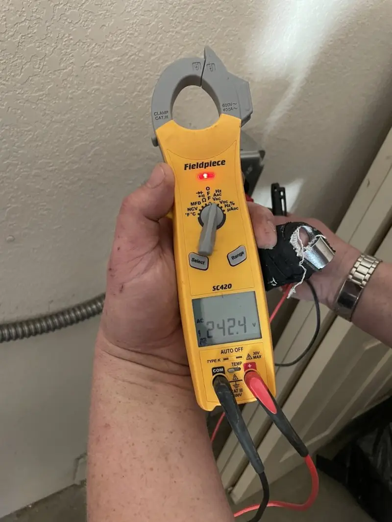 Voltage testing with clamp meter during Hot Tub / Pool Electrical Wiring in Montevideo